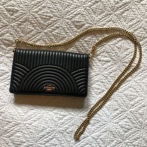 Coach foldover chain clutch